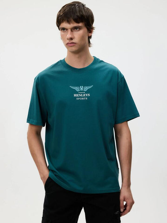 Image of a model wearing Tops. Productname: Henleys Recreation Tee in Forest colour by brand - Henleys