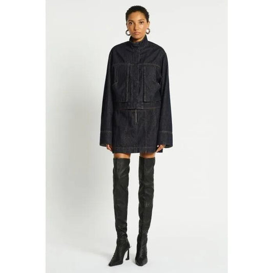 Image of a model wearing Denim. Productname: Labyrinth Denim Mini Skirt in RAW INDIGO colour by brand - sass and bide