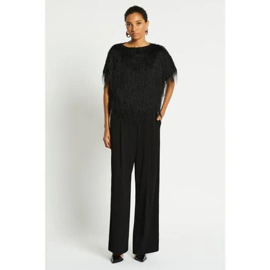 Image of a model wearing Tops. Productname: Dolce Top in Black colour by brand - sass and bide