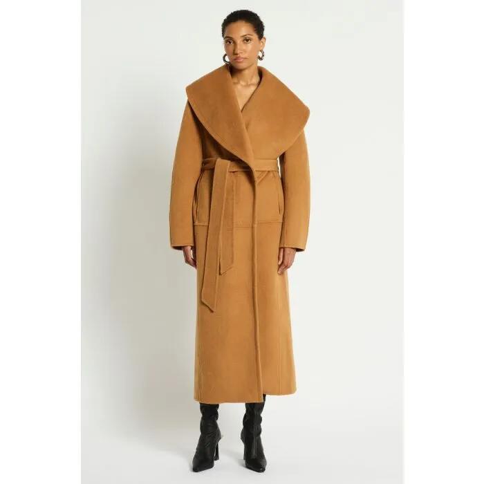 Image of a model wearing Outerwear. Productname: Como Coat in BISCOTTI colour by brand - sass and bide