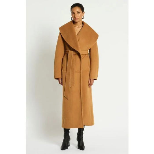 Image of a model wearing Outerwear. Productname: Como Coat in BISCOTTI colour by brand - sass and bide
