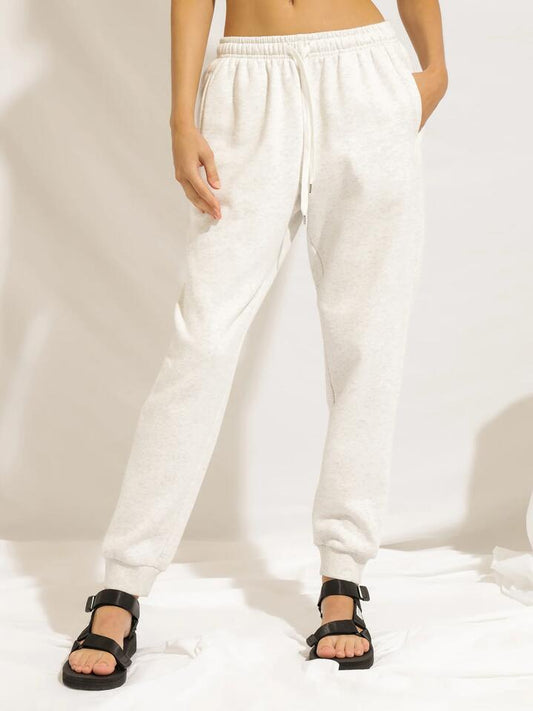 Image of a model wearing Pants. Productname: Nude Lucy Carter Trackpant in Snow Marle colour by brand - Nude Lucy