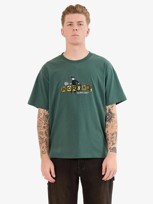 Image of a model wearing Tops. Productname: Worship Don't Get Caught Tee in BISTRO GREEN colour by brand - Worship
