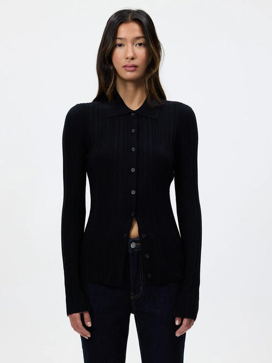 Image of a model wearing Tops. Productname: Lulu & Rose Leonie Button Up Knit Top in Black colour by brand - Lulu & Rose