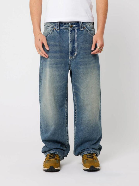 Image of a model wearing Denim. Productname: Abrand A6 Big Stitch Max Jeans in MID VINTAGE INDIGO colour by brand - Abrand