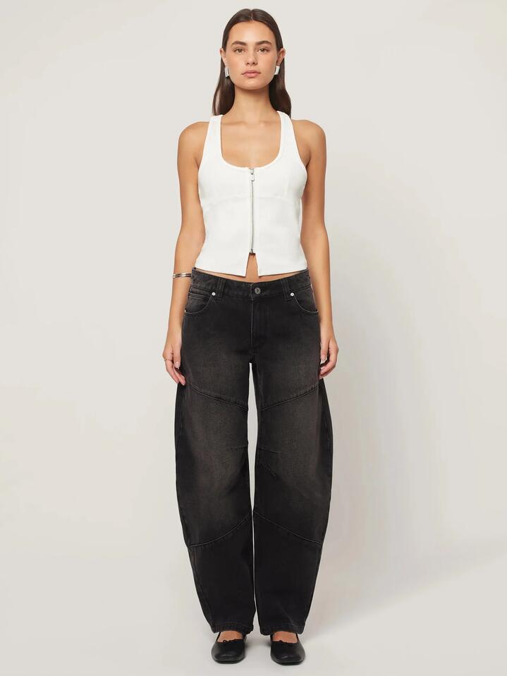 Image of a model wearing Denim. Productname: Abrand 99 Barrel Jean Sophie Worn in Washed Black colour by brand - Abrand