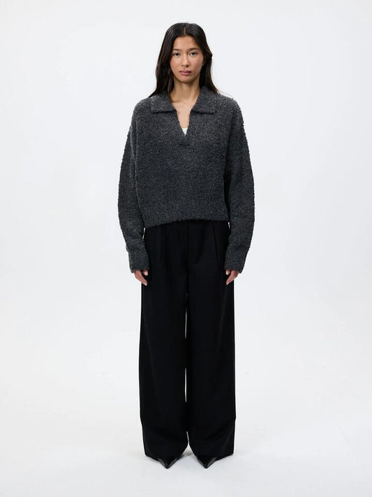 Image of a model wearing Pants. Productname: Lulu & Rose Saskia Tailored Pant in Black colour by brand - Lulu & Rose