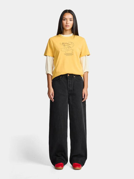Image of a model wearing Tops. Productname: Larriet Lovers Tee in GOLD colour by brand - Larriet