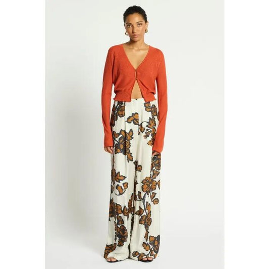 Image of a model wearing Outerwear. Productname: Amber Sands Knit Cardi in APRICOT colour by brand - sass and bide