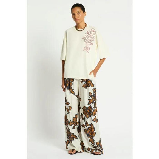 Image of a model wearing Tops. Productname: Norra Tee in STAR IVORY colour by brand - sass and bide
