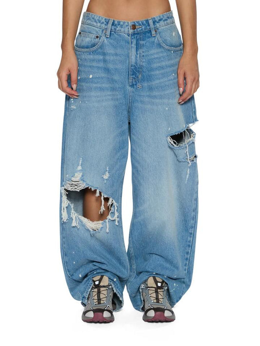 Image of a model wearing Denim. Productname: Ksubi Ksuper Surge Trashed Jean in DENIM colour by brand - Ksubi