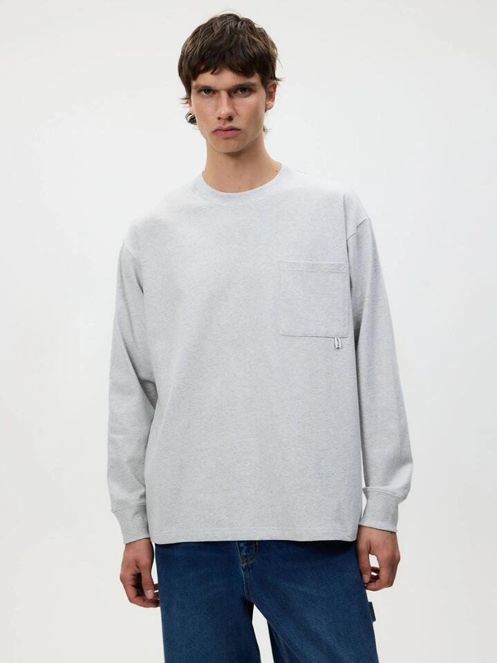 Image of a model wearing Tops. Productname: Article One Sayo Long Sleeve Tee in ASH MARLE colour by brand - Article One