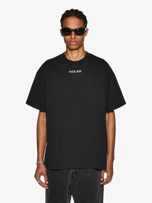 Image of a model wearing Tops. Productname: Ksubi Sott Ekcess SS Tee in Jet Black colour by brand - Ksubi