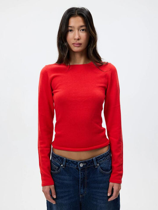 Image of a model wearing Tops. Productname: MSE Long Sleeve Knit Top in Flame colour by brand - MSE