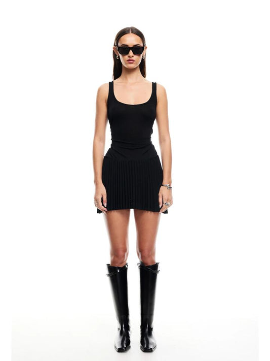 Image of a model wearing Dress. Productname: Lioness Field Of Dreams Mini in Onyx colour by brand - Lioness
