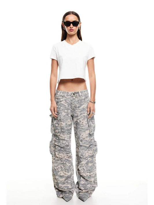 Image of a model wearing Denim. Productname: Lioness Sweetness Jean in Digital Camo colour by brand - Lioness