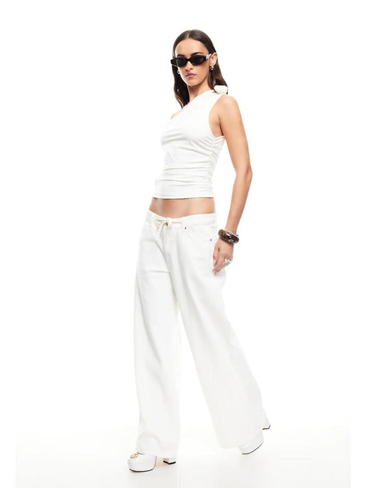 Image of a model wearing Denim. Productname: Lioness Muse Jean in Porcelain colour by brand - Lioness