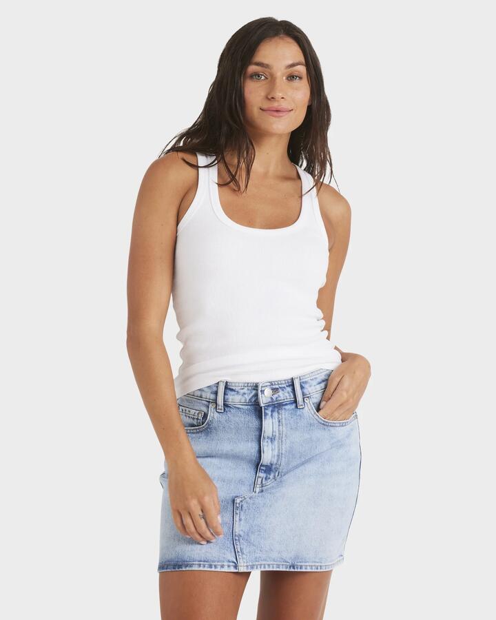 Image of a model wearing Tops. Product name - Roxy Womens Base Rib Tank Top Bright White in Bright White colour by brand - Roxy