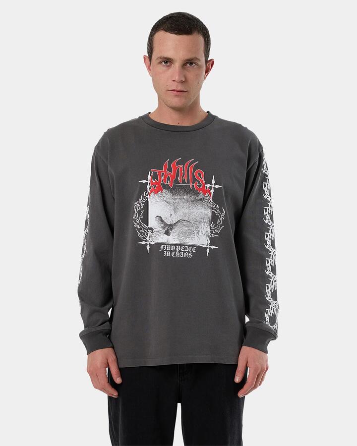 Image of a model wearing Tops. Product name - Thrills Mens Peaceful Chaos Oversize Long Sleeve T-Shirt Merch Black in Merch Black colour by brand - Thrills
