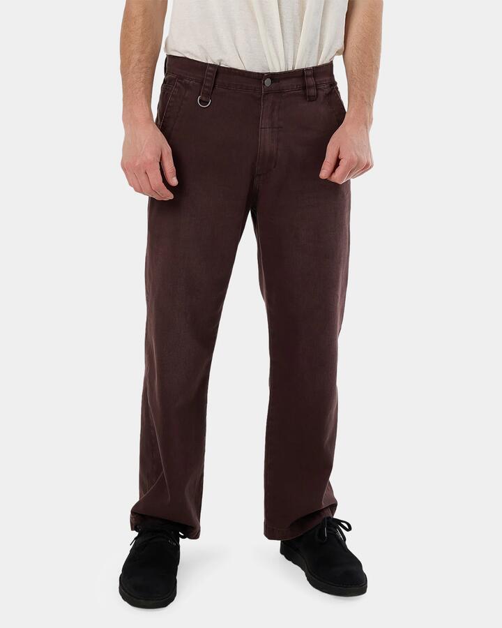 Image of a model wearing Pants. Product name - Thrills Mens Thrills Union Slacker Work Pants Java in Java colour by brand - Thrills