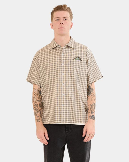 Image of a model wearing Tops. Productname: Worship - Mens Brassy Short Sleeve Shirt - Zine - in Zine colour by brand - Worship