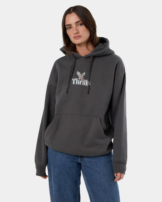 Image of a model wearing Outerwear. Productname: Thrills - Womens Strenght And Glory Slouch Pullover Hoodie - Merch Black - in Merch Black colour by brand - Thrills