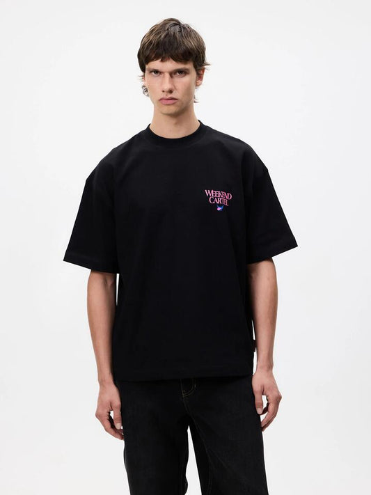 Image of a model wearing Tops. Productname: Weekend Cartel Plants Tee in Black colour by brand - Weekend Cartel