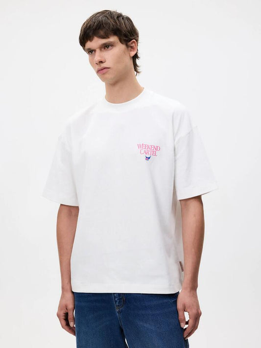 Image of a model wearing Tops. Productname: Weekend Cartel Plants Tee in White colour by brand - Weekend Cartel