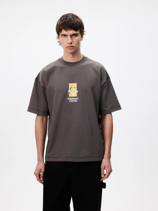 Image of a model wearing Tops. Productname: Weekend Cartel Business Tee in Obsidian colour by brand - Weekend Cartel