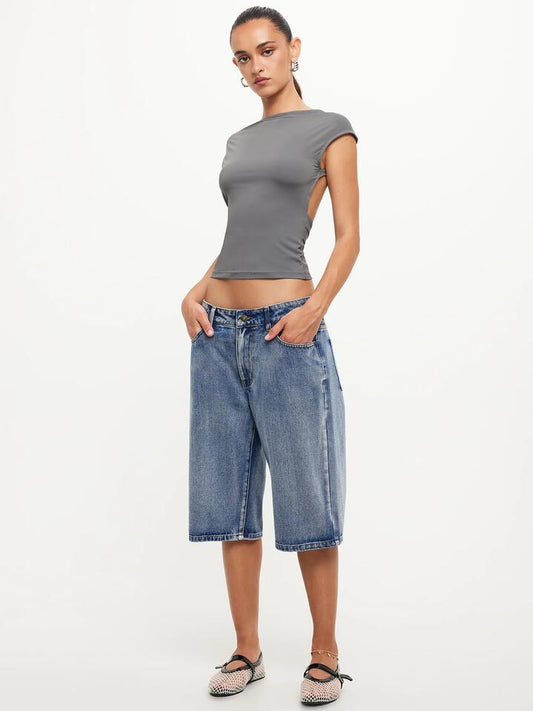 Image of a model wearing Denim. Productname: Lioness Kurt Jorts in Blue Acid colour by brand - Lioness