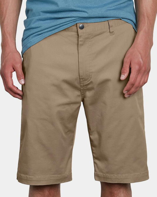 Image of a model wearing Shorts. Productname: Volcom Mens V Monty Stretch Walk Shorts Khaki - in Khaki colour by brand - Volcom