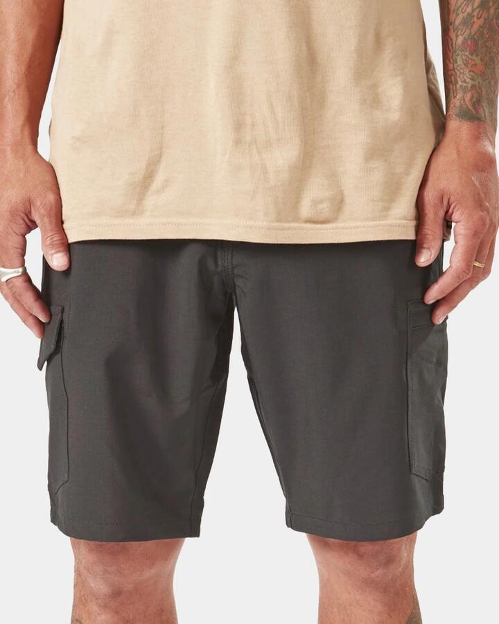 Image of a model wearing Shorts. Product name - Volcom Mens Slab 20" Hybrid Shorts Black in Black colour by brand - Volcom