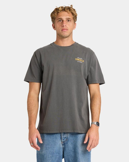 Image of a model wearing Tops. Productname: Thrills Mens Thrills Take Wing Merch Fit T-Shirt Merch Black - in Merch Black colour by brand - Thrills