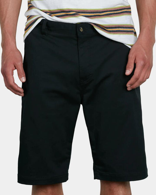 Image of a model wearing Shorts. Productname: Volcom Mens V Monty Stretch Chino Shorts Black - in Black colour by brand - Volcom