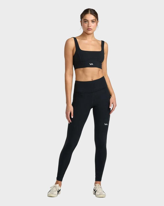 Image of a model wearing Pants. Productname: RVCA Womens Va Essential Leggings Black - in Black colour by brand - RVCA