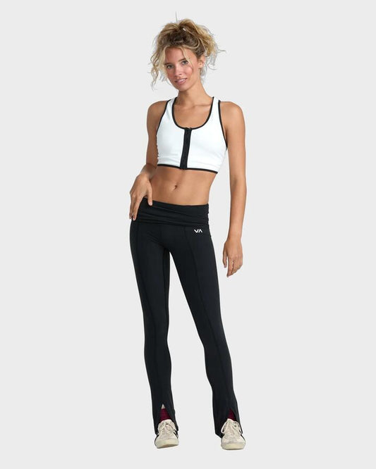 Image of a model wearing Pants. Productname: RVCA Womens Aren Split Leggings Black - in Black colour by brand - RVCA