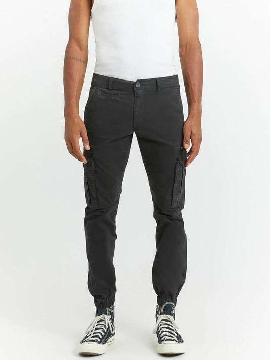 Image of a model wearing Pants. Productname: Henleys Eagle Cargo Pants in Black colour by brand - Henleys