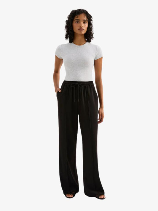 Image of a model wearing Pants. Productname: Nude Lucy Quincy Pant in Black colour by brand - Nude Lucy