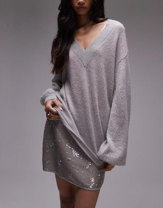 Image of a model wearing Skirts. Productname: Topshop Sequin Micro Mini Skirt in Silver Grey colour by brand - Topshop