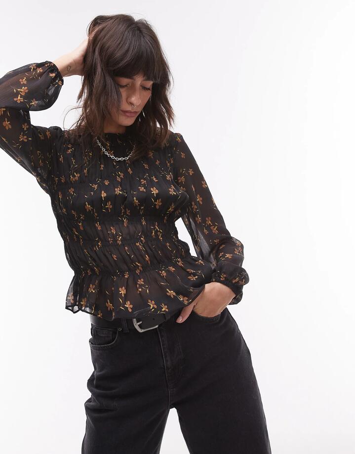 Image of a model wearing Tops. Productname: Topshop Shirred Top in Black Ditsy in Black colour by brand - Topshop