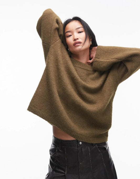 Image of a model wearing Outerwear. Productname: Topshop Knitted Boxy Fluffy Crew Jumper in KHAKI colour by brand - Topshop