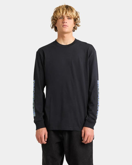 Image of a model wearing Tops. Product name - Billabong Mens Spec 73 Long Sleeve T-Shirt Black in Black colour by brand - Billabong