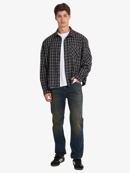 Image of a model wearing Denim. Productname: Neuw Ray Straight Sierra in OVERDYE INDIGO colour by brand - Neuw