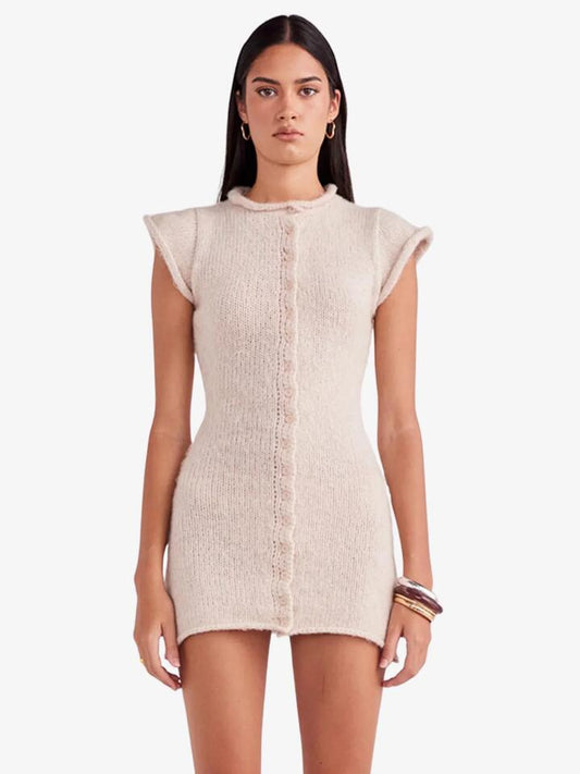 Image of a model wearing Dress. Productname: SNDYS Haze Mini Dress in Oat colour by brand - SNDYS