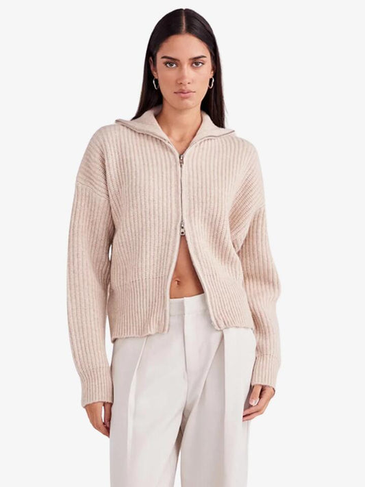 Image of a model wearing Outerwear. Productname: SNDYS Haze Zip Jumper in Oat colour by brand - SNDYS