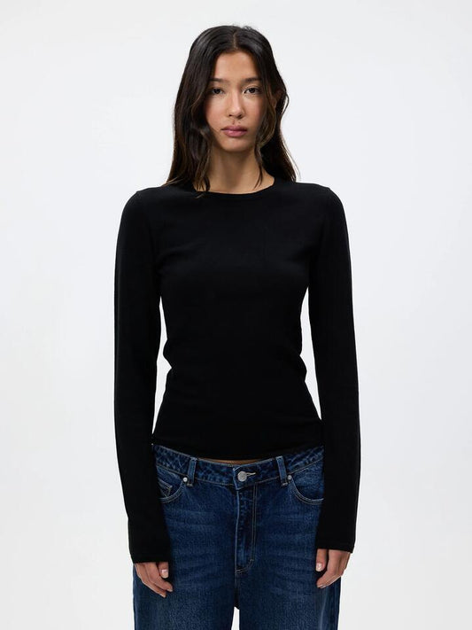 Image of a model wearing Tops. Productname: MSE Long Sleeve Knit Top in Black colour by brand - MSE