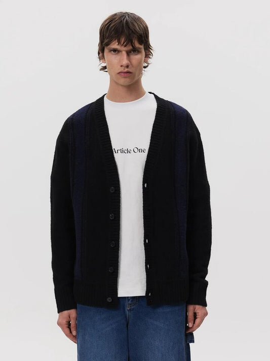 Image of a model wearing Outerwear. Productname: Article One Ray Cardigan in Black Stripe colour by brand - Article One