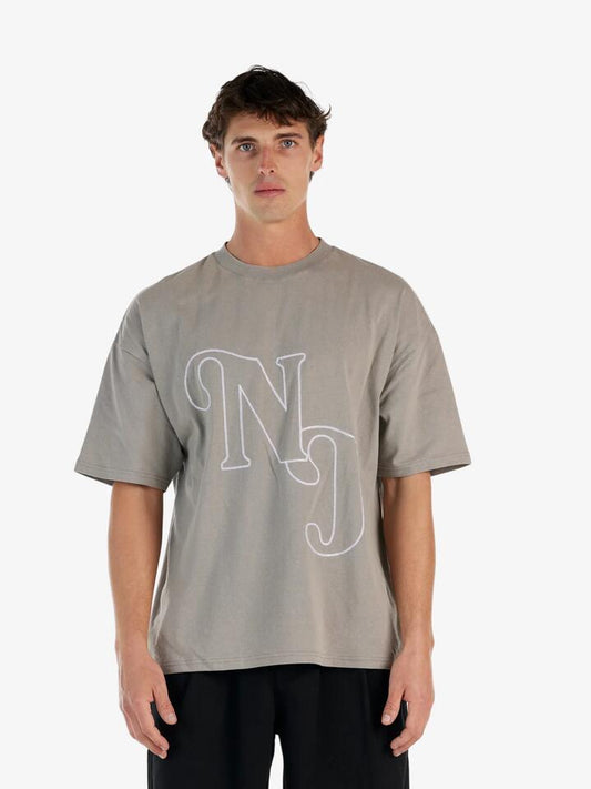 Image of a model wearing Tops. Productname: Nana Judy Wembley Tee in Enzyme Grey colour by brand - Nana Judy