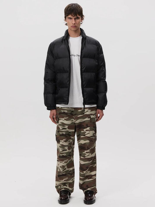 Image of a model wearing Outerwear. Productname: Article One Lofty Puffer Jacket in Black colour by brand - Article One