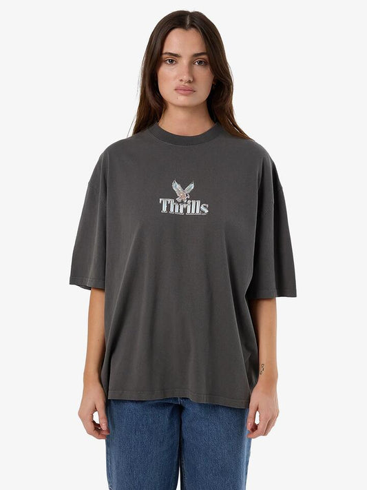 Image of a model wearing Tops. Productname: Thrills Strength and Glory Oversized Tee in MERCH BLACK colour by brand - Thrills